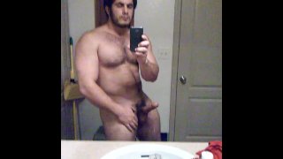 MUSCLE BEAR FLEXING AND CUMS IN GLASS