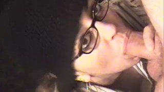 Sexy brunette with glasses blows cock and eats cum