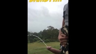 Aussie Pissing Outdoors While Rock Hard