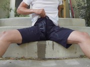 Preview 1 of Pissing black athletic shorts outdoors and jerking off into my t-shirt