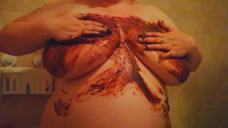 BBW spreading chocolate gateau all over my large breasts