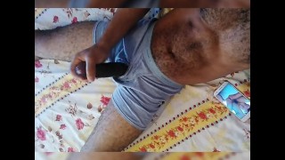 Amateur Horny boy watching porn on phone and masturbating his black cock
