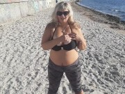 Preview 2 of Blonde women at public beach showing big naked boobs and ass