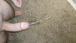 pissing the carpet and cum afterwards