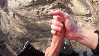 GIRLFRIEND GIVES RISKY QUICK HANDJOB AT A PUBLIC BEACH