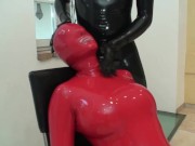 Preview 2 of used Rubber Whore in Red Latex Catsuit And Mask Bounded Slapped Pissed