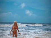 Preview 1 of Tik Tok. Beach Voyeur looks on Blonde Teen enjoying Topless in the waves.