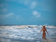 Preview 5 of Tik Tok. Beach Voyeur looks on Blonde Teen enjoying Topless in the waves.