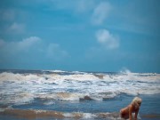 Preview 6 of Tik Tok. Beach Voyeur looks on Blonde Teen enjoying Topless in the waves.