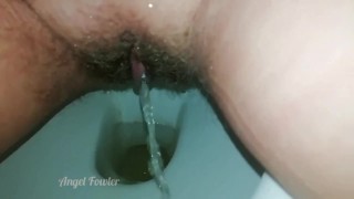 A lustful bitch lured her into the train toilet and let herself be fucked