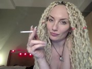 Preview 2 of Hot blonde with big tits sensual smoking topless in front of cam