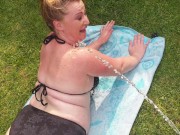 Preview 6 of Bbw getting a surprise body and face piss while tanning outside in the garden