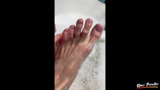 show and caress my feet in the bathroom. Soft and gentle feet in foam