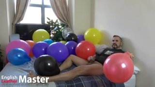 DILF blows and pops balloons before cumming on one like a looner PREVIEW