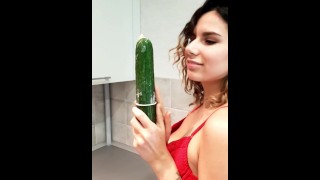 Slim beauty has fun with a HUGE Cucumber