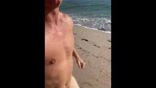 Hot guy runs naked on the beach 