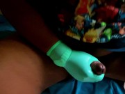 Preview 5 of Ssecnirpnailati opening a pair of sealed green surgical gloves.