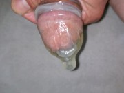 Preview 1 of Filling condom with piss