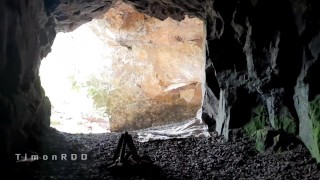 Neanderthal man masturbates dick in a cave near a campfire