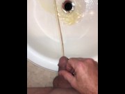 Preview 2 of Naughty Pissing and Cumming in my bathroom sink featuring a bullseye cumshot into the drain