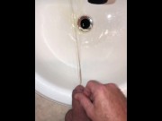 Preview 3 of Naughty Pissing and Cumming in my bathroom sink featuring a bullseye cumshot into the drain