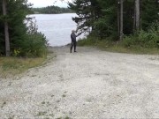 Preview 6 of wetsuited silicone masked man on patrol near lake