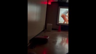 Stroking Cock at Adult Theatre