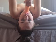 Preview 1 of Gagging brunette making her face sloppy as she gives a dildo a blowjob while laying upside down