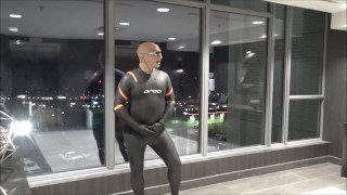 quick walk to hotel elevators in orca wetsuit, silicone mask and massive hardon