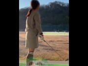 Preview 3 of A beautiful woman swings golf in a miniskirt. The camera is taken from directly below.