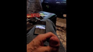 hubby stroking his cock while watching video of him eating my pussy on his phone