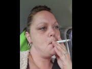 Preview 2 of HOT Babe having a smoke while waiting in the car