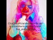 Preview 1 of Sexy CLOWN sucking on a banana and playing with her tits