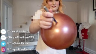 Gold balloon popped with ass
