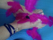 Preview 1 of Mature woman puts her feet on fire, rubbing them with soft feathers