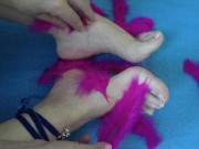 Preview 2 of Mature woman puts her feet on fire, rubbing them with soft feathers