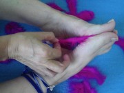 Preview 6 of Mature woman puts her feet on fire, rubbing them with soft feathers