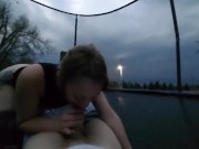 Preview 1 of Big booty white girl sucks dick and fucks on trampoline during tornado warning