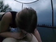 Preview 4 of Big booty white girl sucks dick and fucks on trampoline during tornado warning