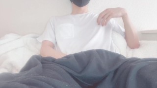 Frontal masturbation while playing with nipples of a man with a big dick
