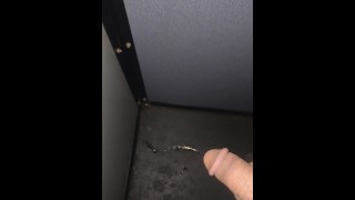 Pissing in adult book store booth