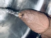 Preview 1 of Uncut dick is pissing into the sink for 12th time