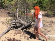 Preview 3 of redhead milf pissing in the woods standing on a log 4K 60fps