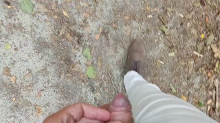 Pissing while walking in a forest