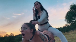 ChihuahuaSU and Mistress Glamorous. Lesbian domination in the meadow with a strap-on