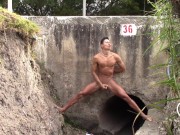Preview 1 of Daring Young Man Undresses In a CULVERT Under The Road And Masturbates Tasty With His Legs Spread.