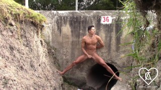 Daring Young Man Undresses In a CULVERT Under The Road And Masturbates Tasty With His Legs Spread.