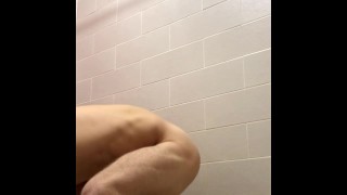 A muscular guy GOT EXCITED in the gym SHOWER and JERKS off his penis