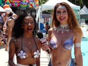 Preview 4 of Naked News reporter in mermaid body paint at Xbiz Miami interviews