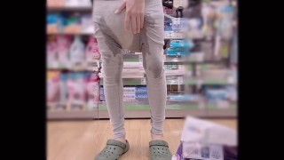 Pee overflows from a big diaper while shopping and masturbates with that diaper